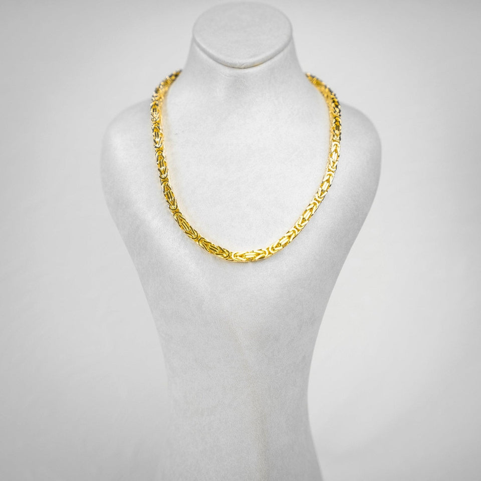Königskette aus 585 Gelbgold mit 4 mm Breite auf einer hellen Schmuckbüste