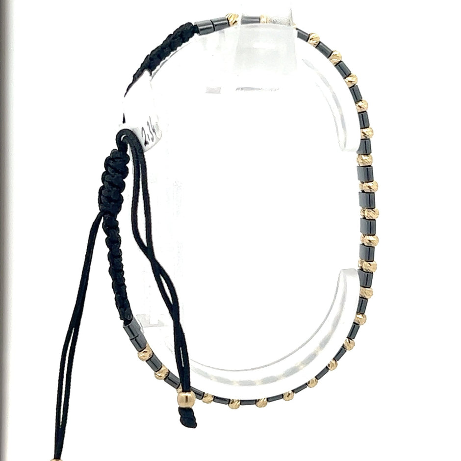 Stoffarmband mit Goldelemente - Juwelier BenjaminStoffarmband mit Goldelemente