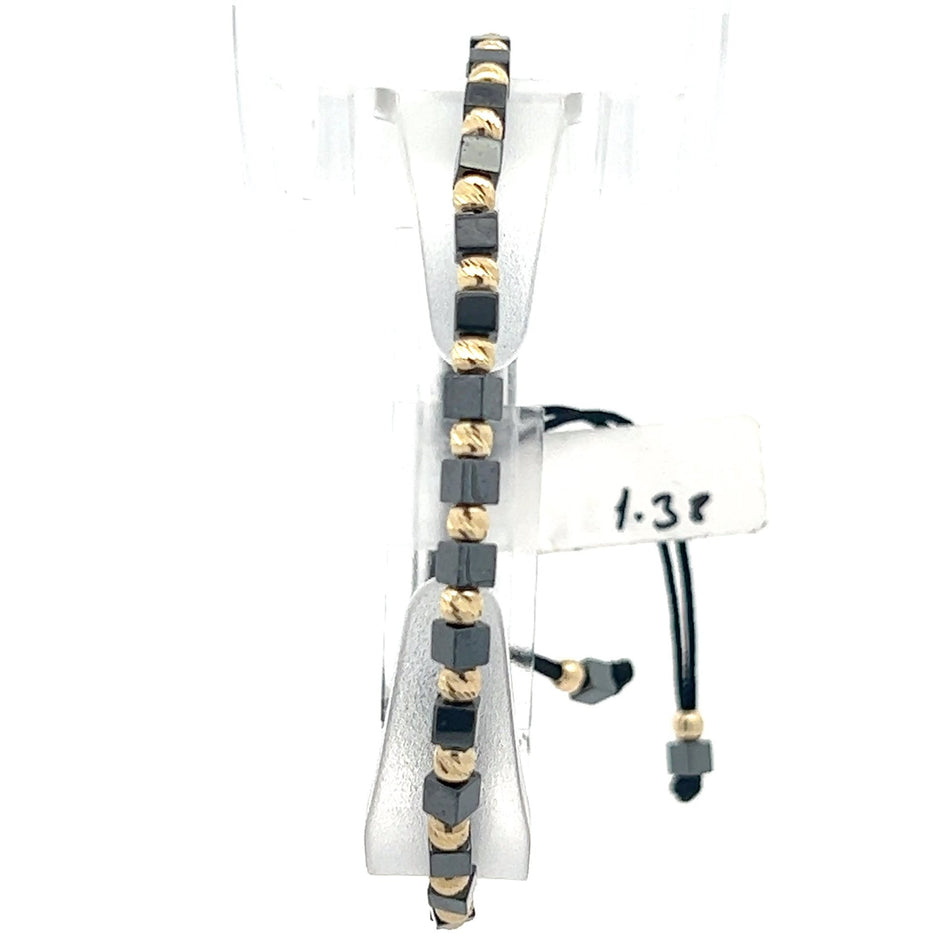 Stoffarmband mit Goldelemente - Juwelier BenjaminStoffarmband mit Goldelemente