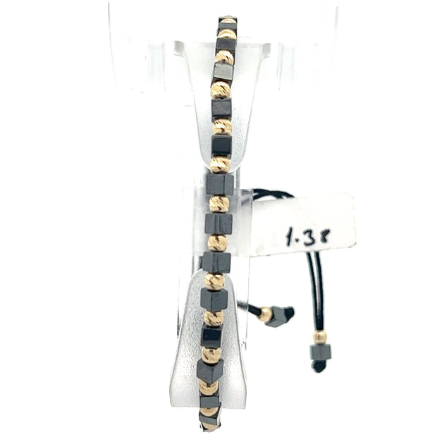 Stoffarmband mit Goldelemente - Juwelier BenjaminStoffarmband mit Goldelemente