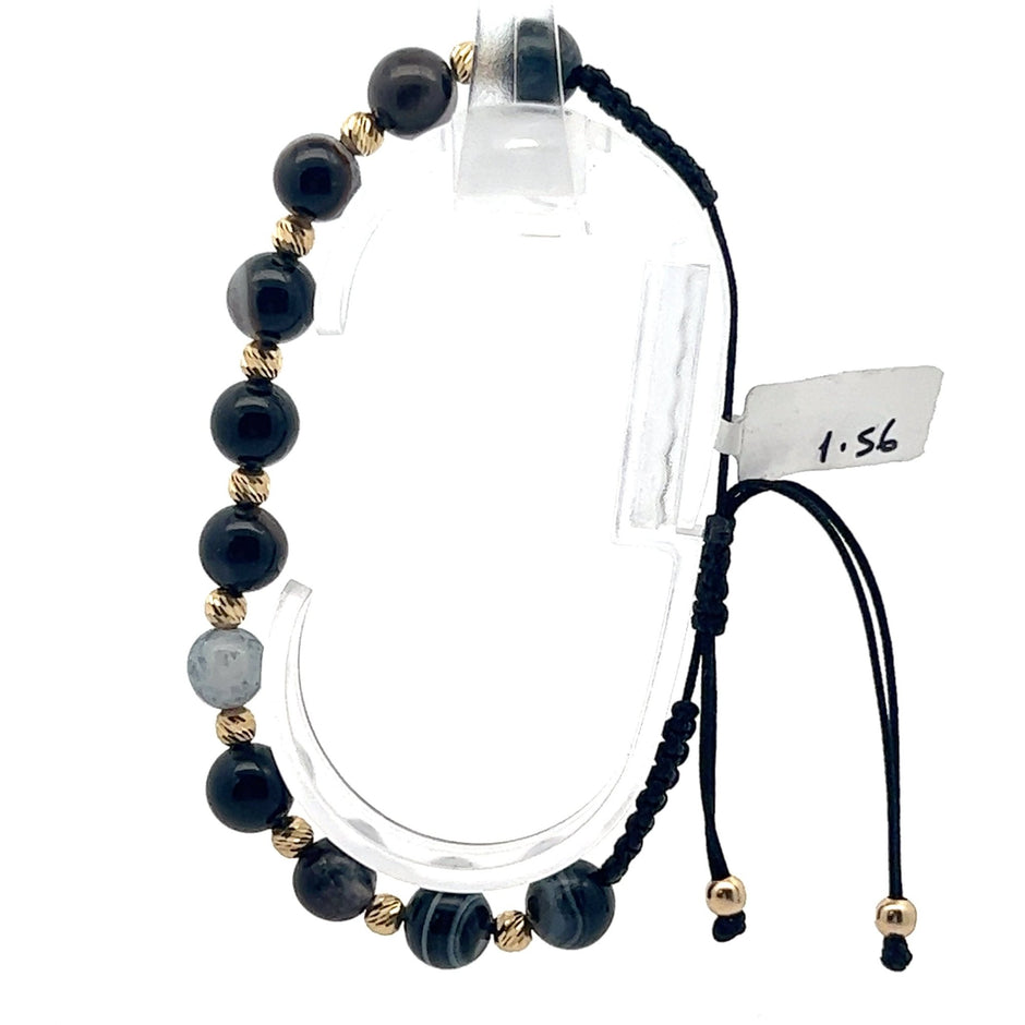 Stoffarmband mit Goldelemente - Juwelier BenjaminStoffarmband mit Goldelemente