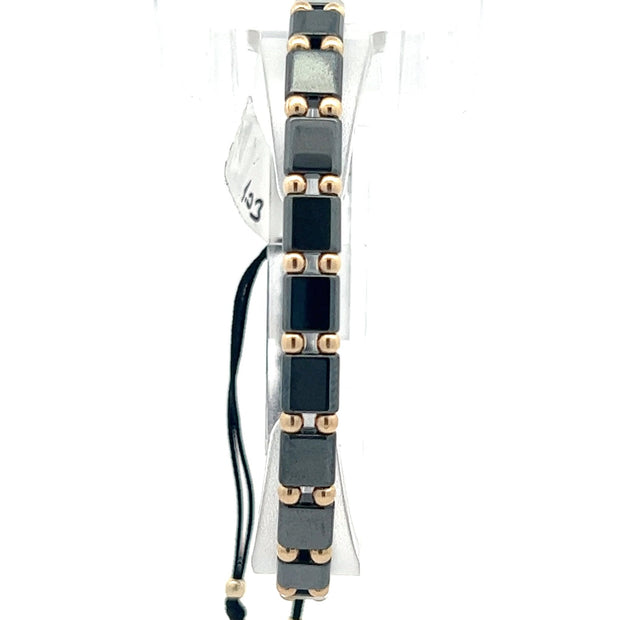 Stoffarmband mit Goldelemente - Juwelier BenjaminStoffarmband mit Goldelemente