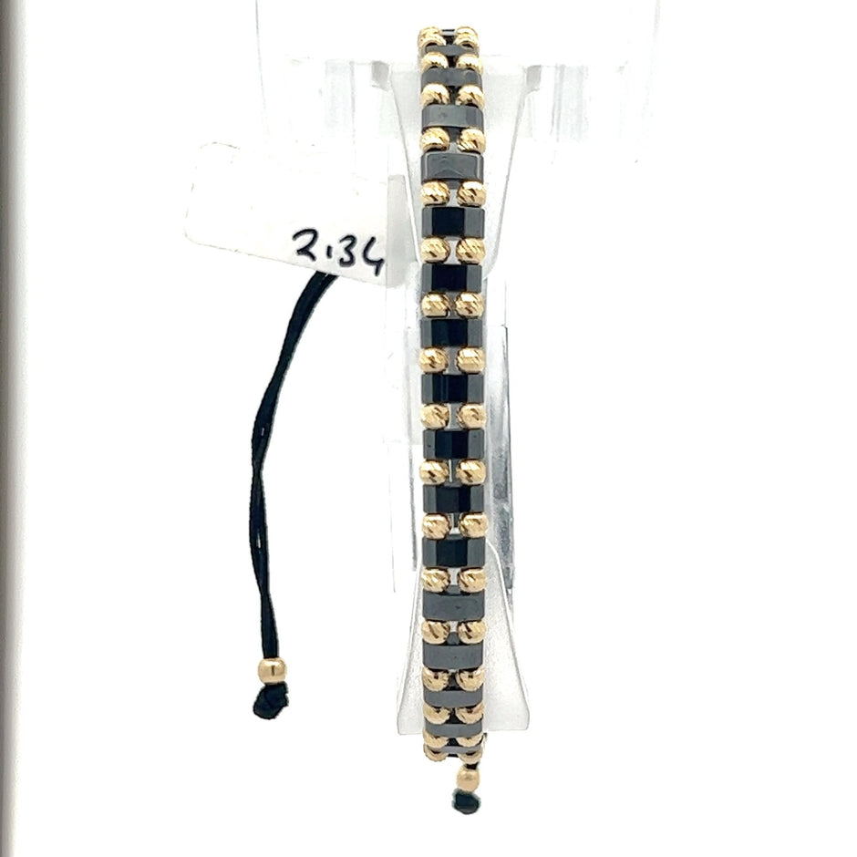 Stoffarmband mit Goldelemente - Juwelier BenjaminStoffarmband mit Goldelemente