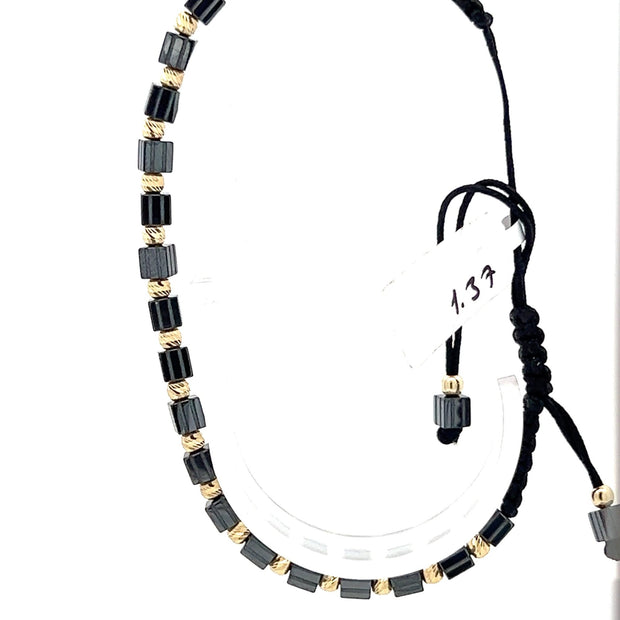 Stoffarmband mit Goldelementen 14 kt - Juwelier BenjaminStoffarmband mit Goldelementen 14 kt