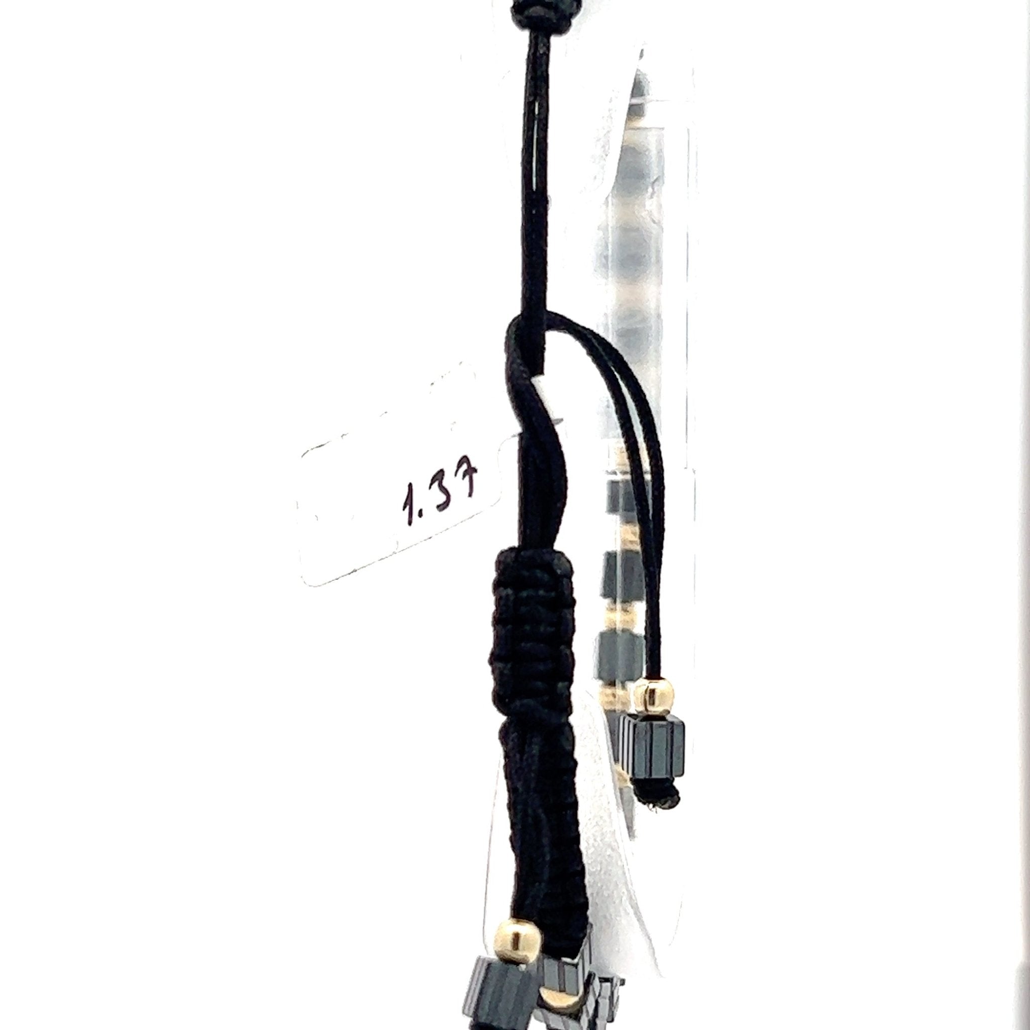 Stoffarmband mit Goldelementen 14 kt - Juwelier BenjaminStoffarmband mit Goldelementen 14 kt