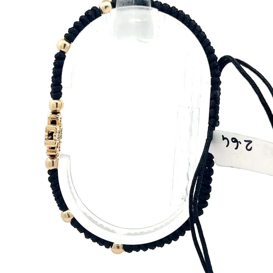 Stoffarmband mit Goldkreuz - Juwelier BenjaminStoffarmband mit Goldkreuz