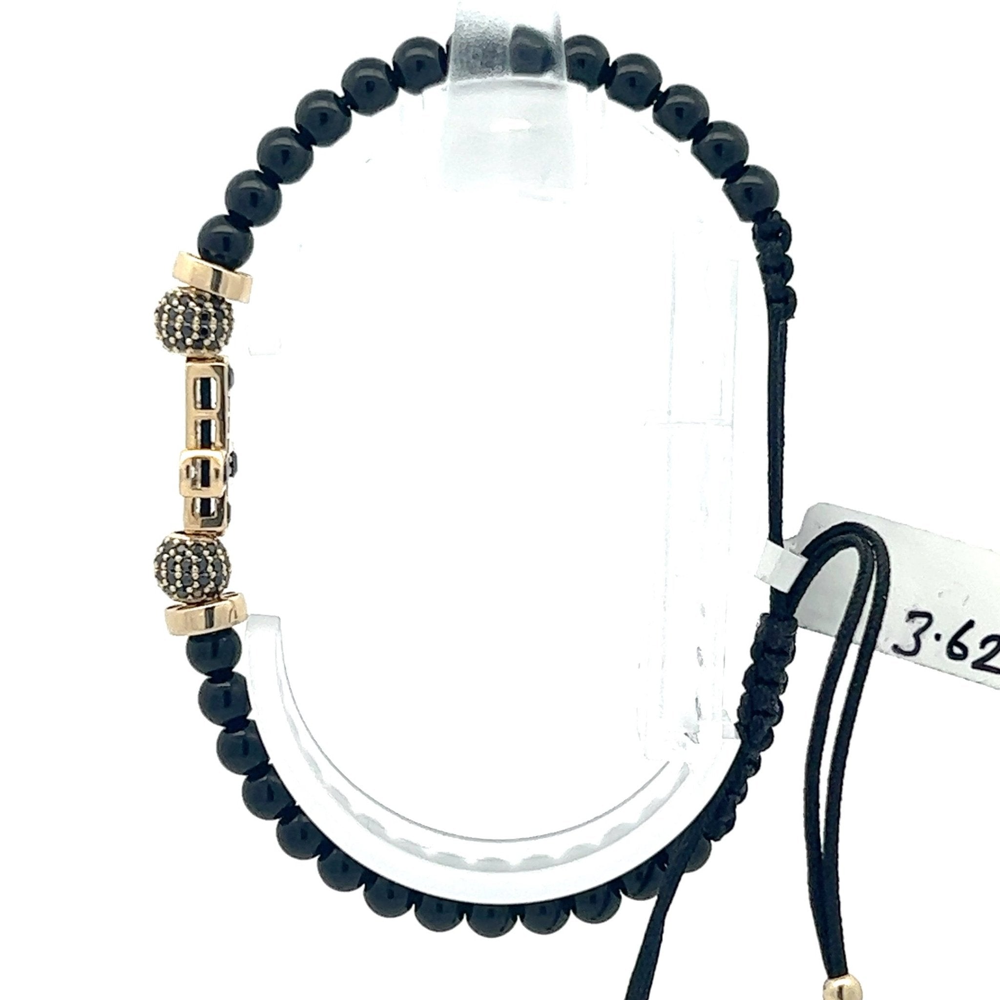 Stoffarmband mit Goldkreuz - Juwelier BenjaminStoffarmband mit Goldkreuz