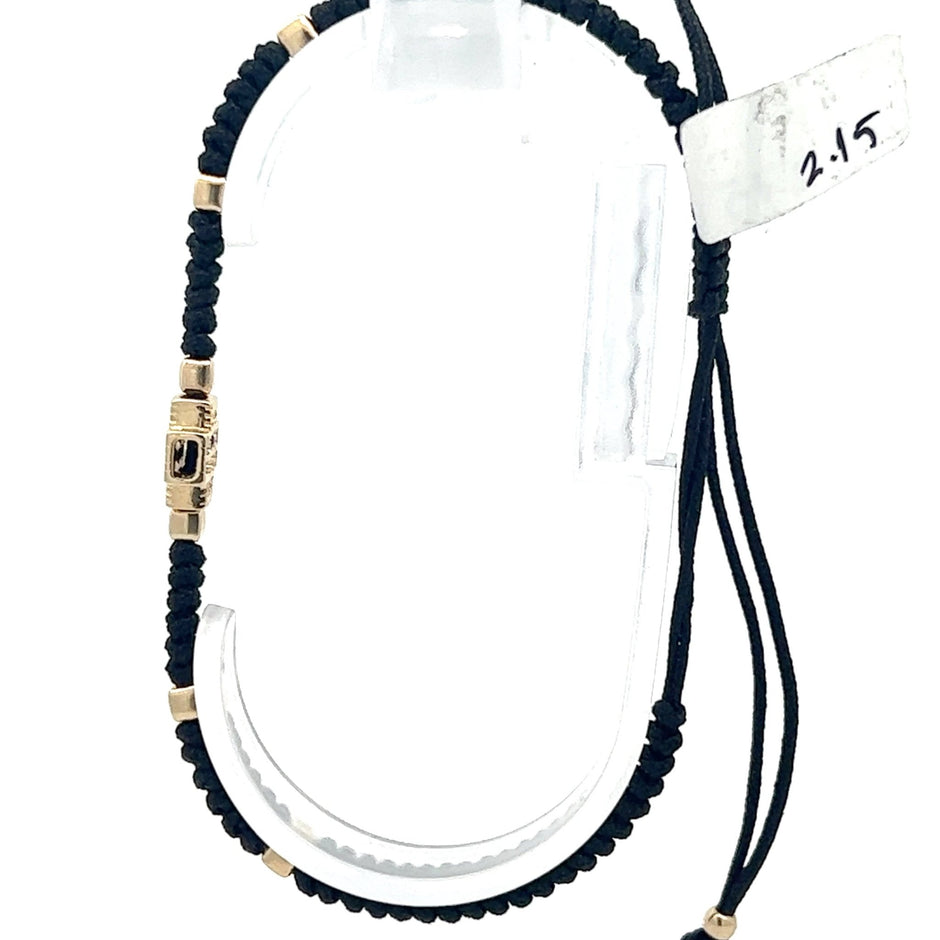 Stoffarmband mit Goldkreuz - Juwelier BenjaminStoffarmband mit Goldkreuz