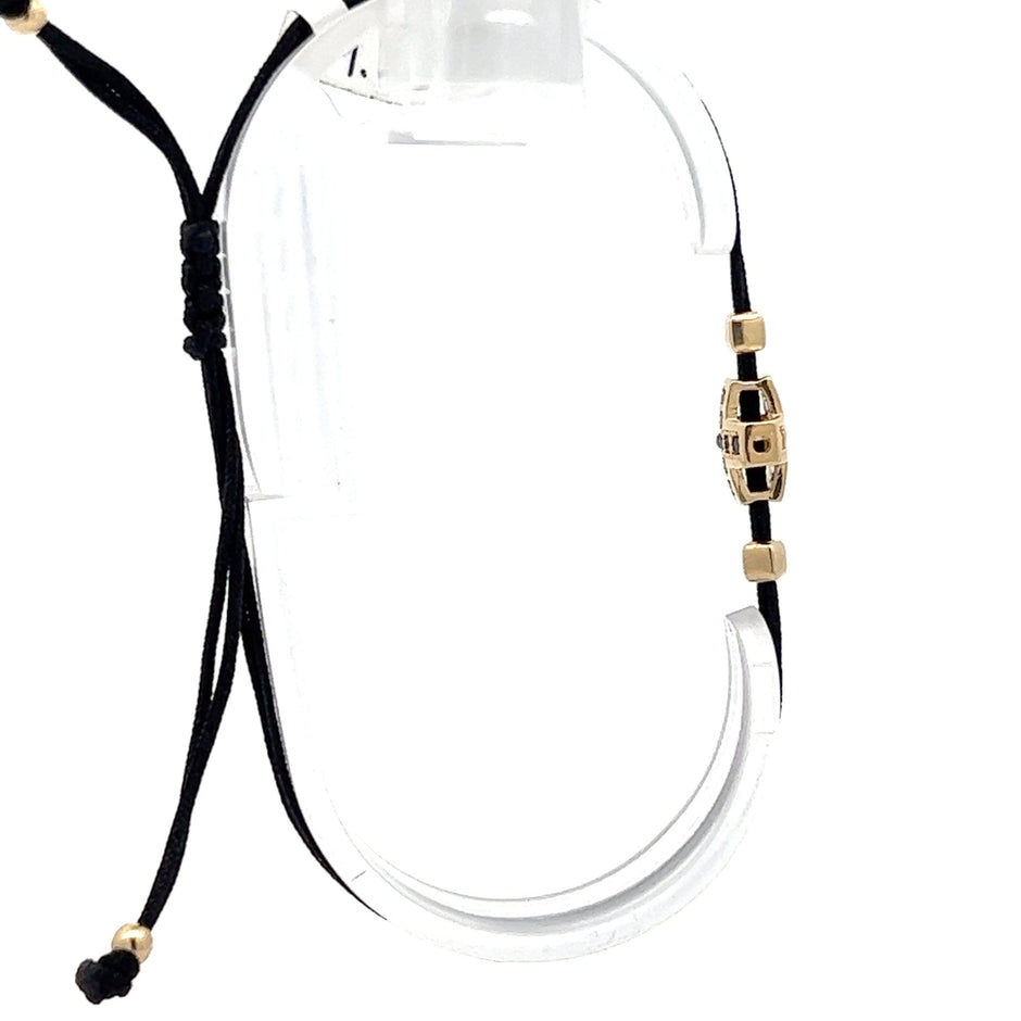 Stoffarmband mit Goldkreuz - Juwelier BenjaminStoffarmband mit Goldkreuz