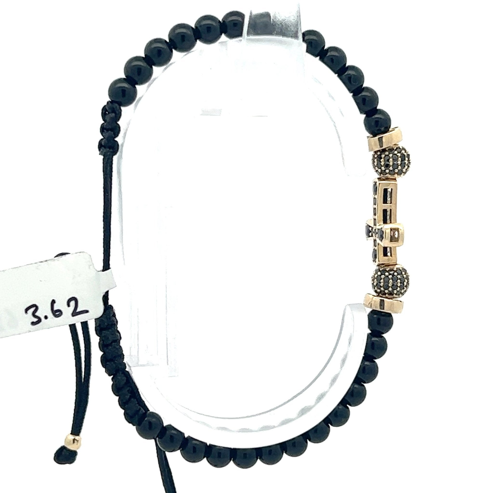 Stoffarmband mit Goldkreuz - Juwelier BenjaminStoffarmband mit Goldkreuz