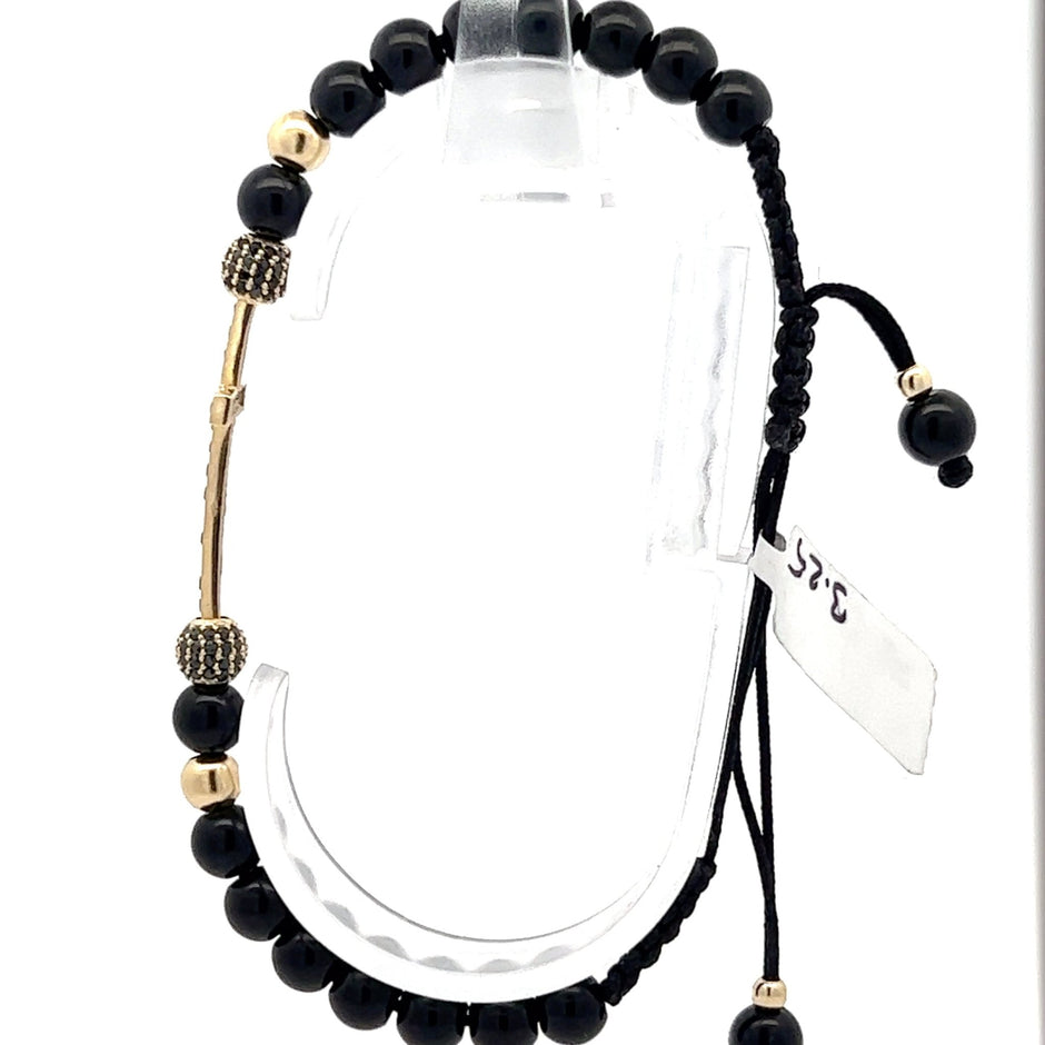 Stoffarmband mit Goldkreuz - Juwelier BenjaminStoffarmband mit Goldkreuz